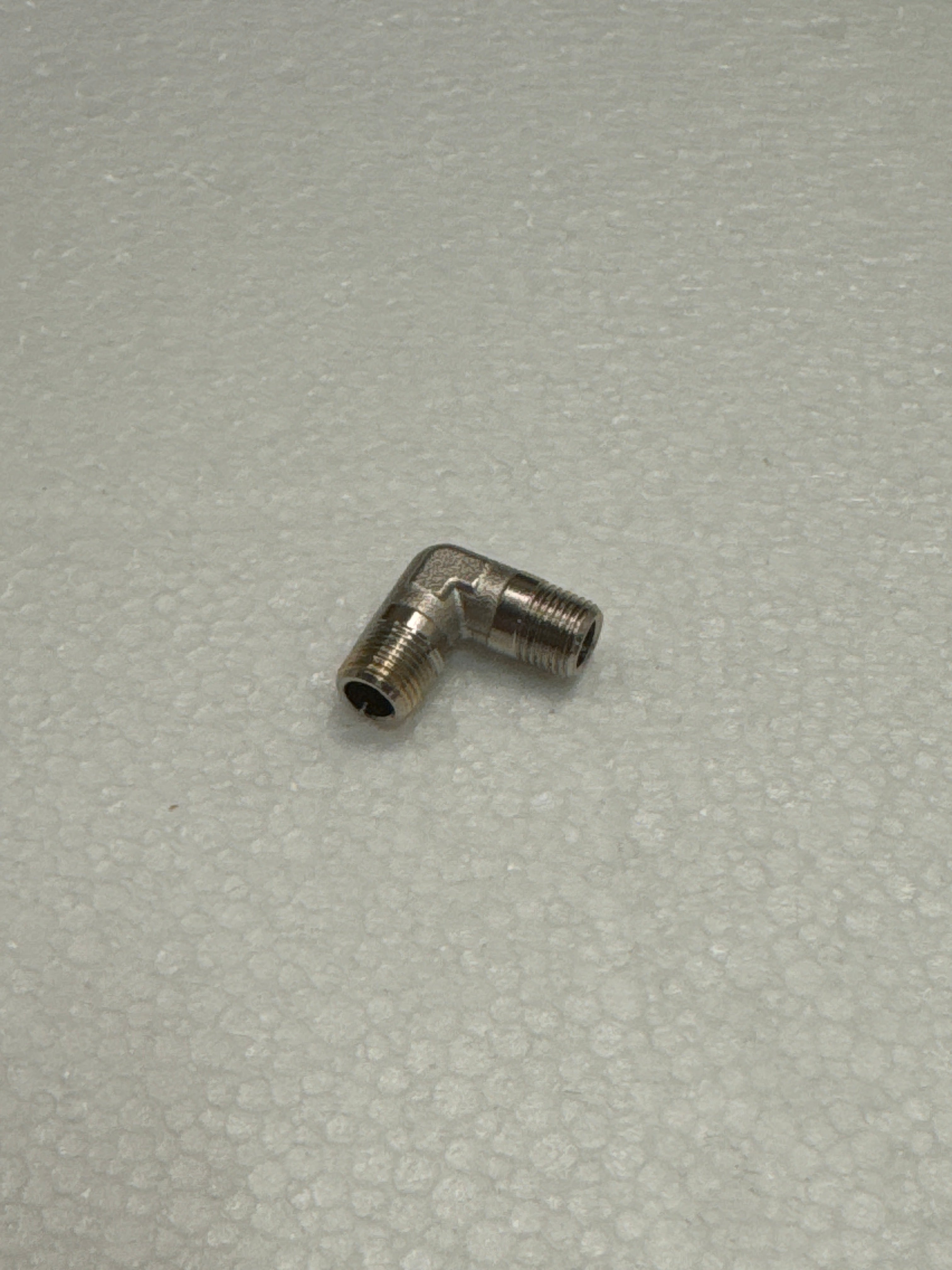 5809830 (07300001) L FITTING 1/8M-M 459